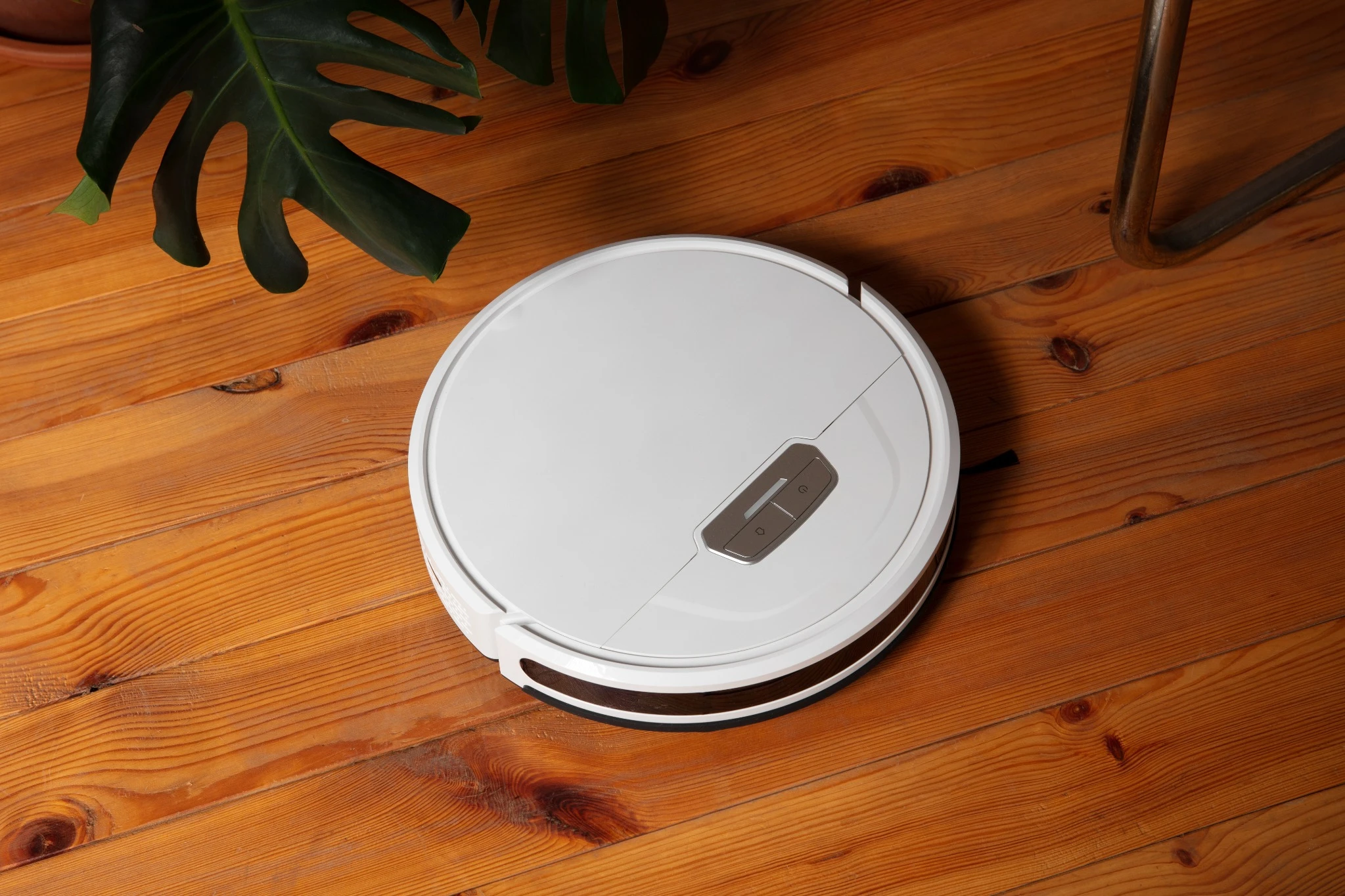 o melhor robô aspirador moderno realizando limpeza automática em casa